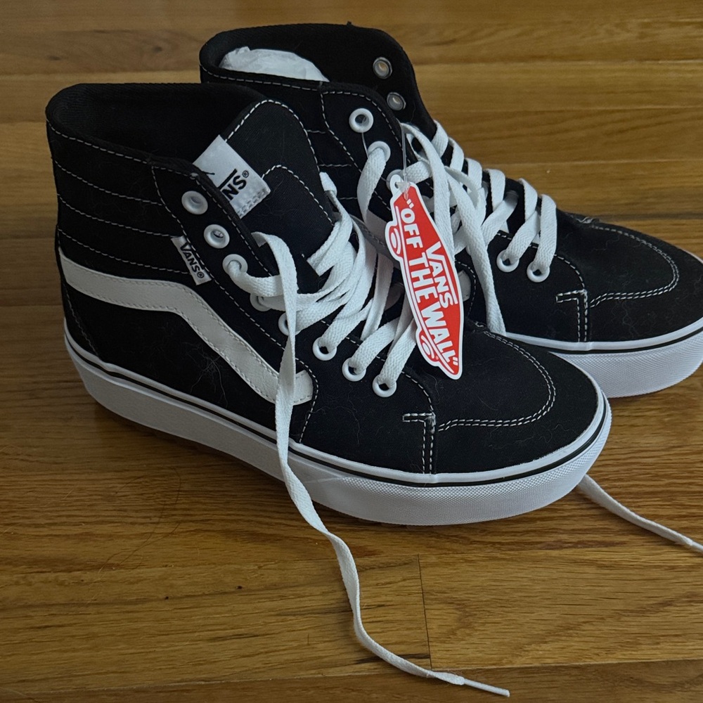 Vans Black and White High-Top Sneakers